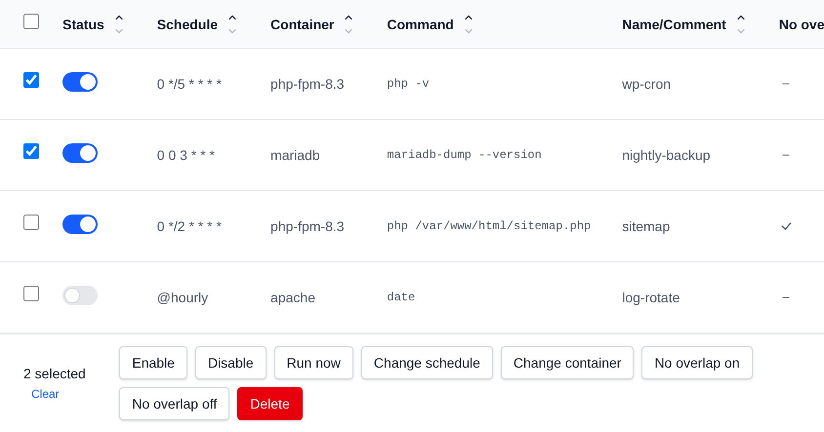 Two cron jobs selected with the bulk actions bar offering Enable, Disable, Run now, Change schedule, Change container, No overlap on, No overlap off and Delete
