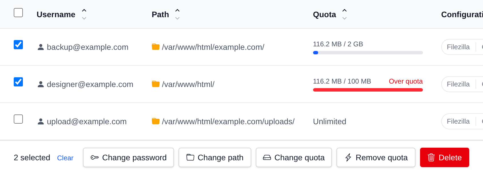 Two FTP accounts selected with the bulk actions bar offering Change password, Change path, Change quota, Remove quota and Delete