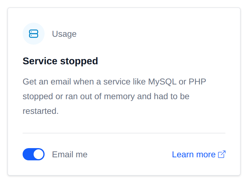 Service stopped card with the Email me switch and a Learn more link