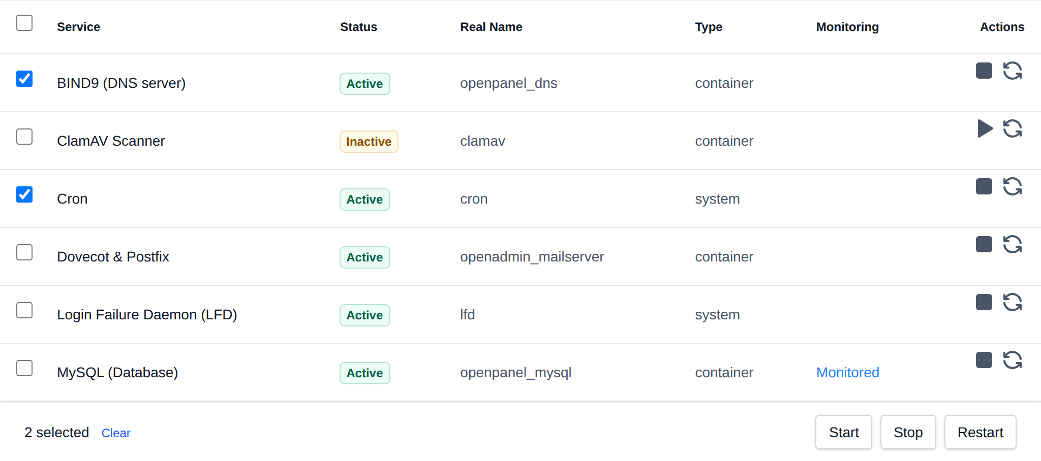 Two services selected with the bulk actions bar offering Start, Stop and Restart