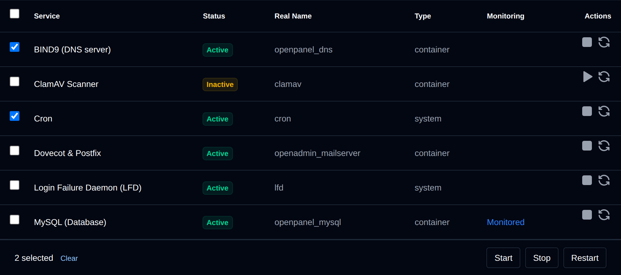Two services selected with the bulk actions bar offering Start, Stop and Restart