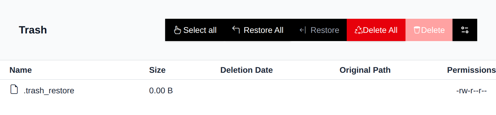 Trash page listing deleted files with Restore and Delete actions