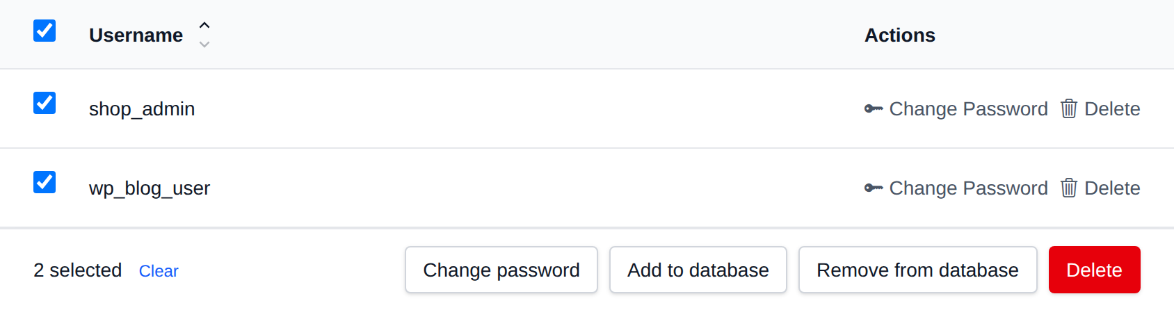 Two database users selected with the bulk actions bar offering Change password, Add to database, Remove from database and Delete