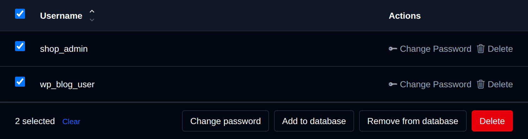 Two database users selected with the bulk actions bar offering Change password, Add to database, Remove from database and Delete