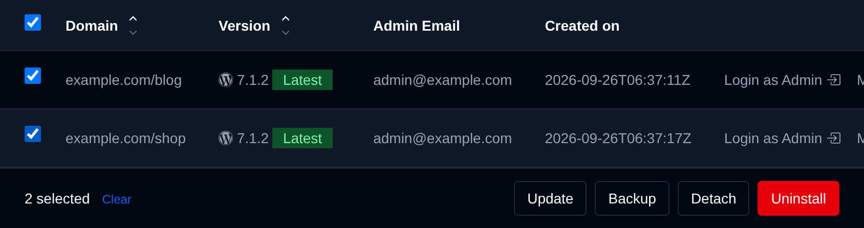 Two WordPress sites selected in the table view with the bulk actions bar offering Update, Backup, Detach and Uninstall